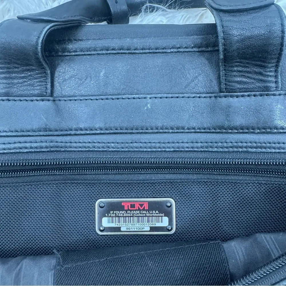 Tumi Black Leather Briefcase with Expandable Pouches Compartments